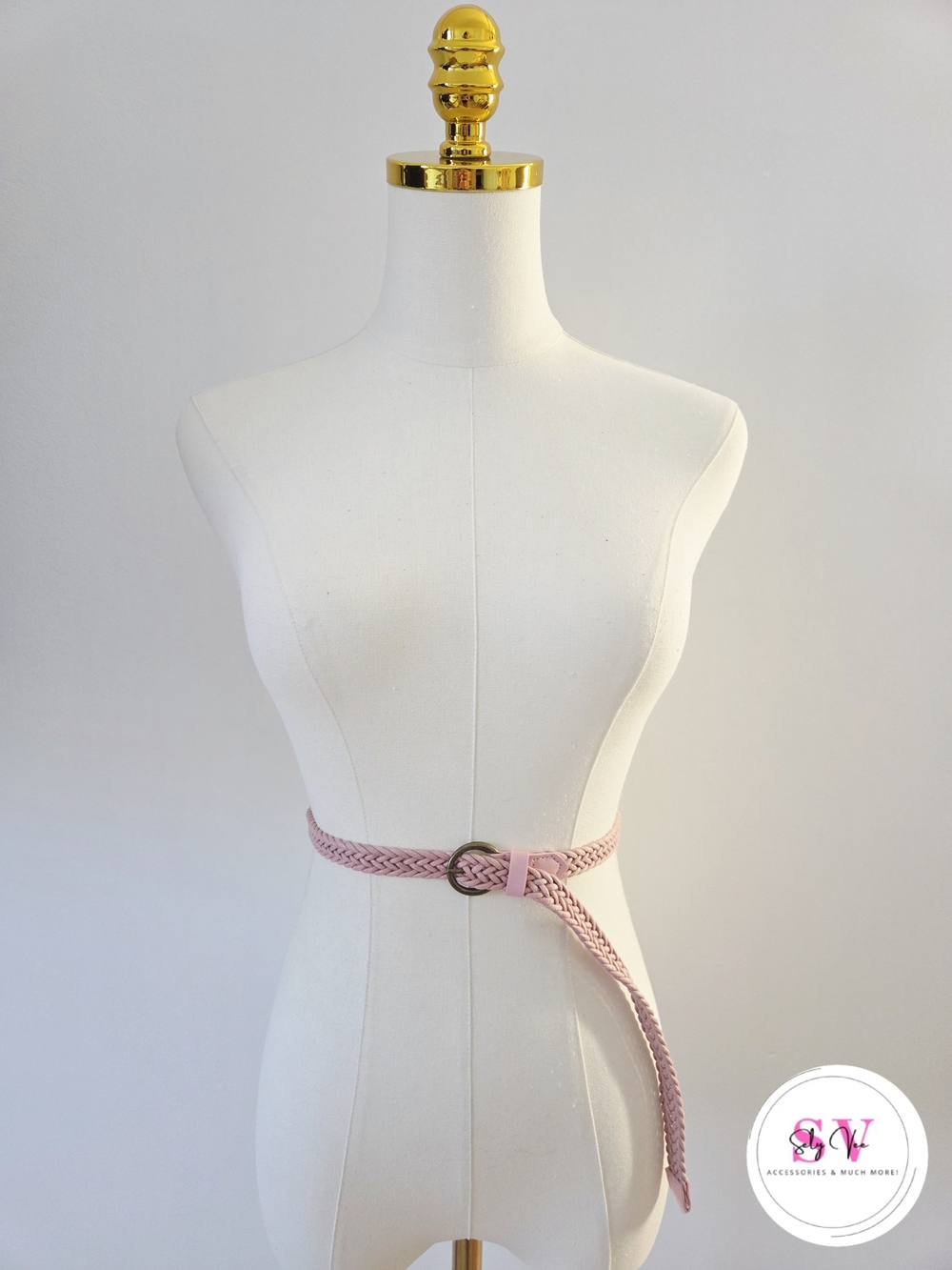 Pink braided belt with gold buckle
